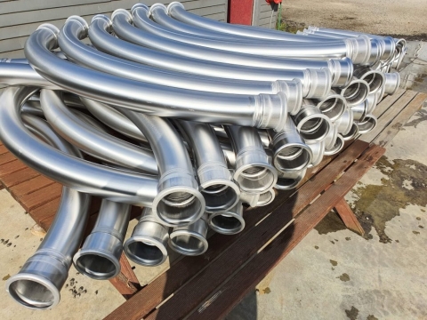 4 inch long radius bends, rolled, welded and acid dipped at Global Stainless